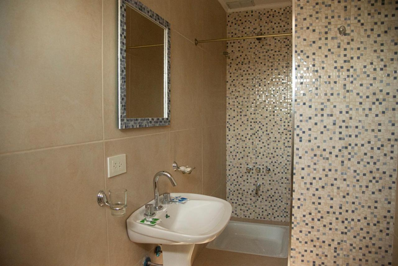 Morada Suites Campana Esterno foto