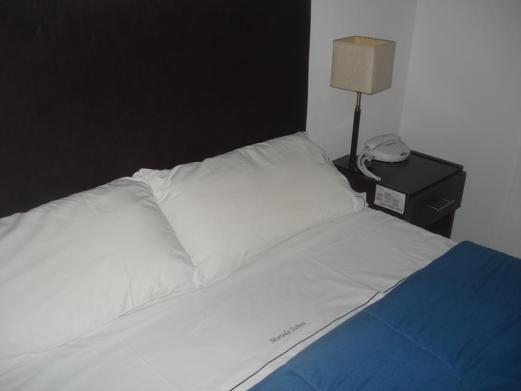 Morada Suites Campana Esterno foto