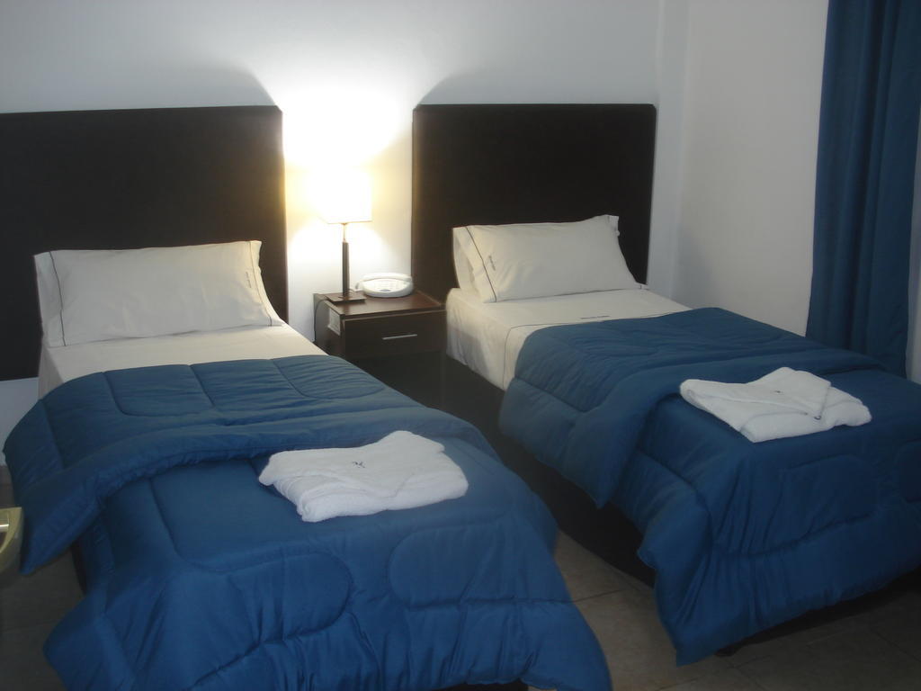 Morada Suites Campana Camera foto