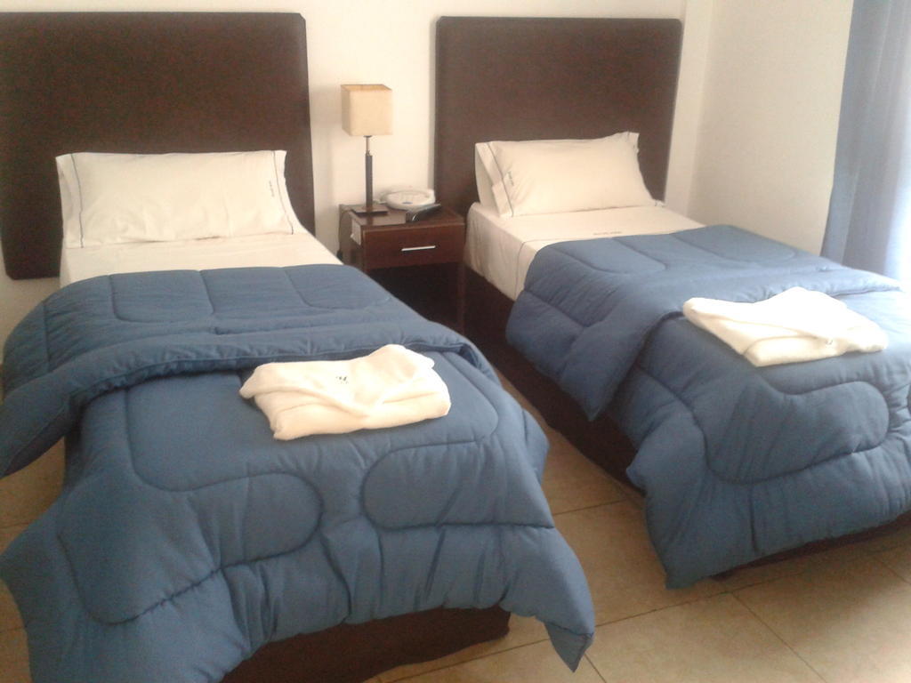 Morada Suites Campana Camera foto