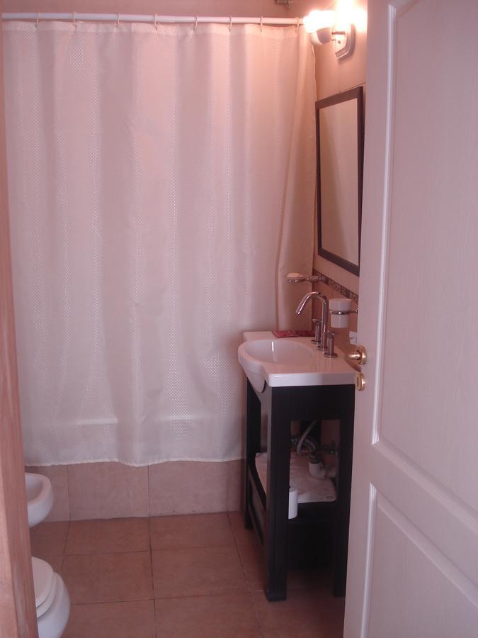 Morada Suites Campana Esterno foto