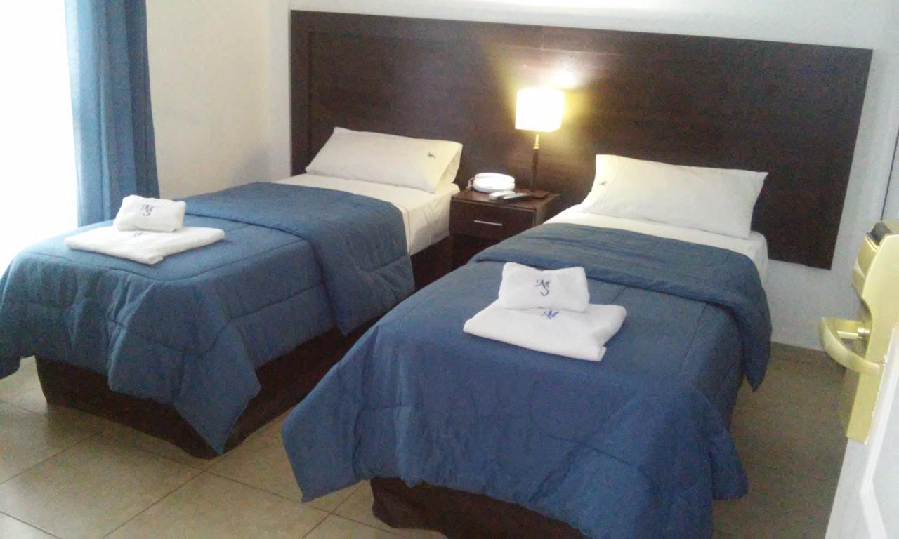 Morada Suites Campana Esterno foto