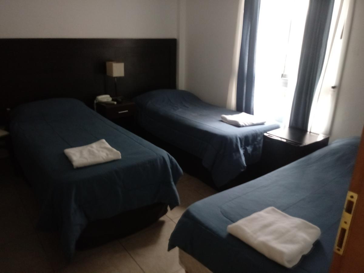 Morada Suites Campana Esterno foto